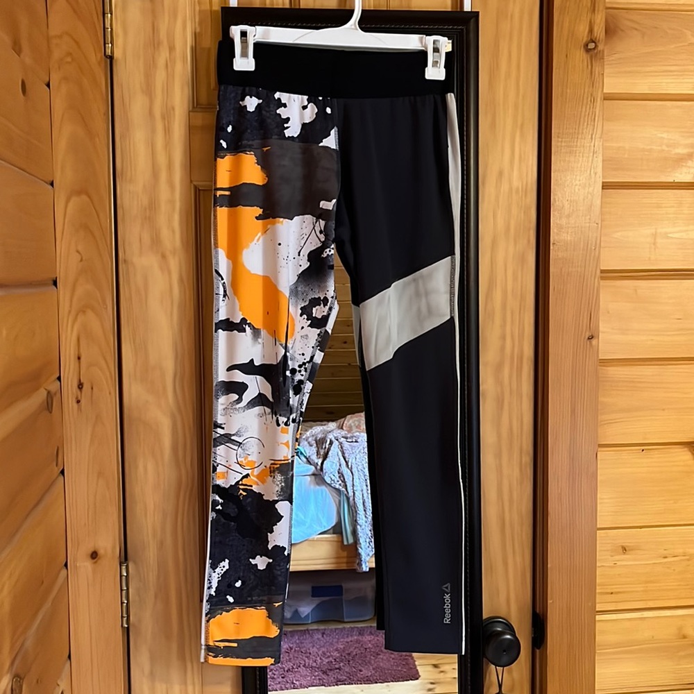 Black, white and orange Speedwick Reebok Leggins